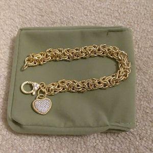 NIB Gold tone rolo bracelet with crystal heart